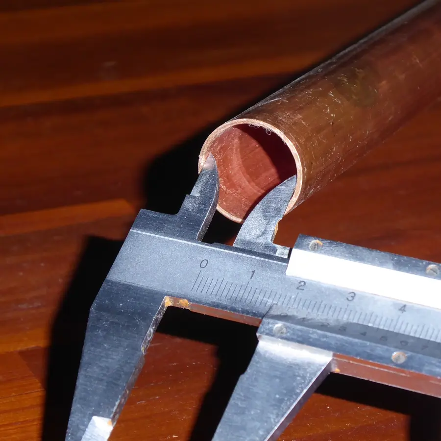 Vernier calliper measuring a pipe