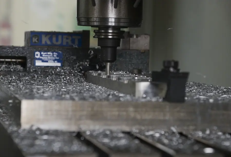 Workpiece clamped in a vise during milling